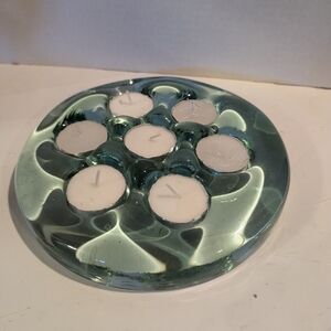 Heavy green glass tealight candle holder made in Spain.  Recycled Glass.